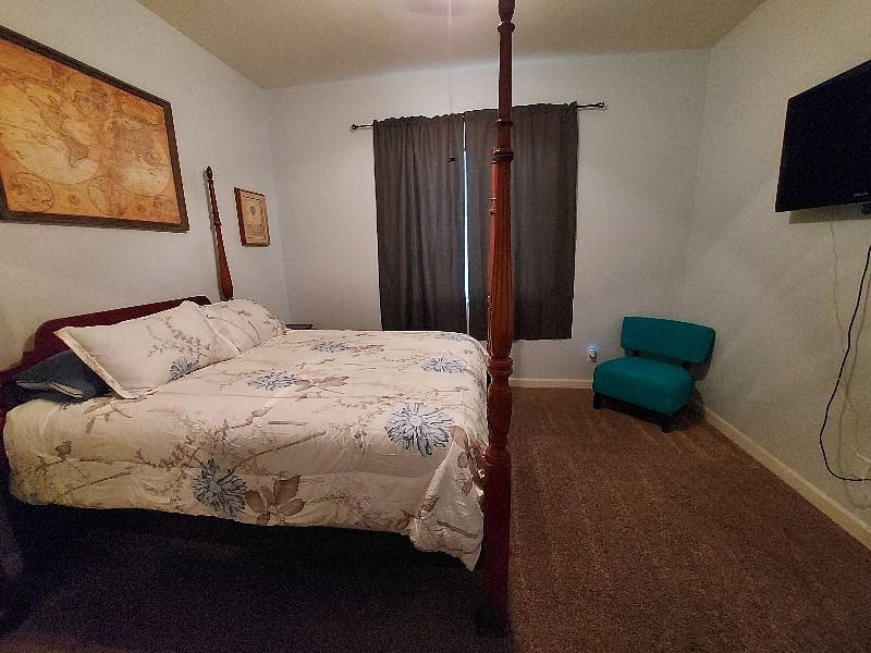 Relax in your Queen size bed and watch some TV
