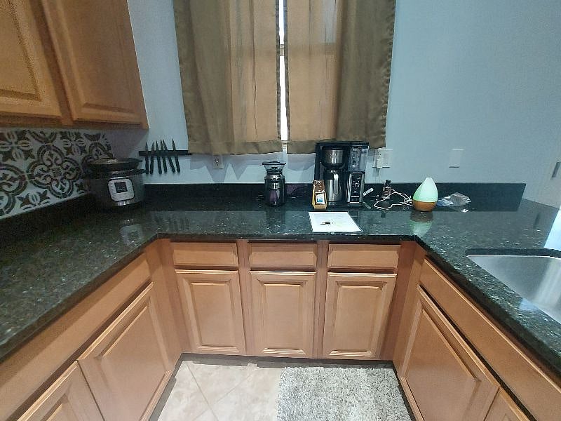 Your kitchenette with lots of kitchen appliances, some are also underneath in cabinets.