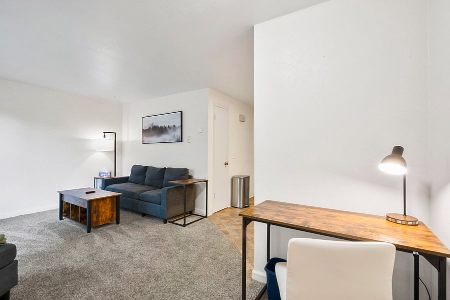 Cozy workspace offside off living room.