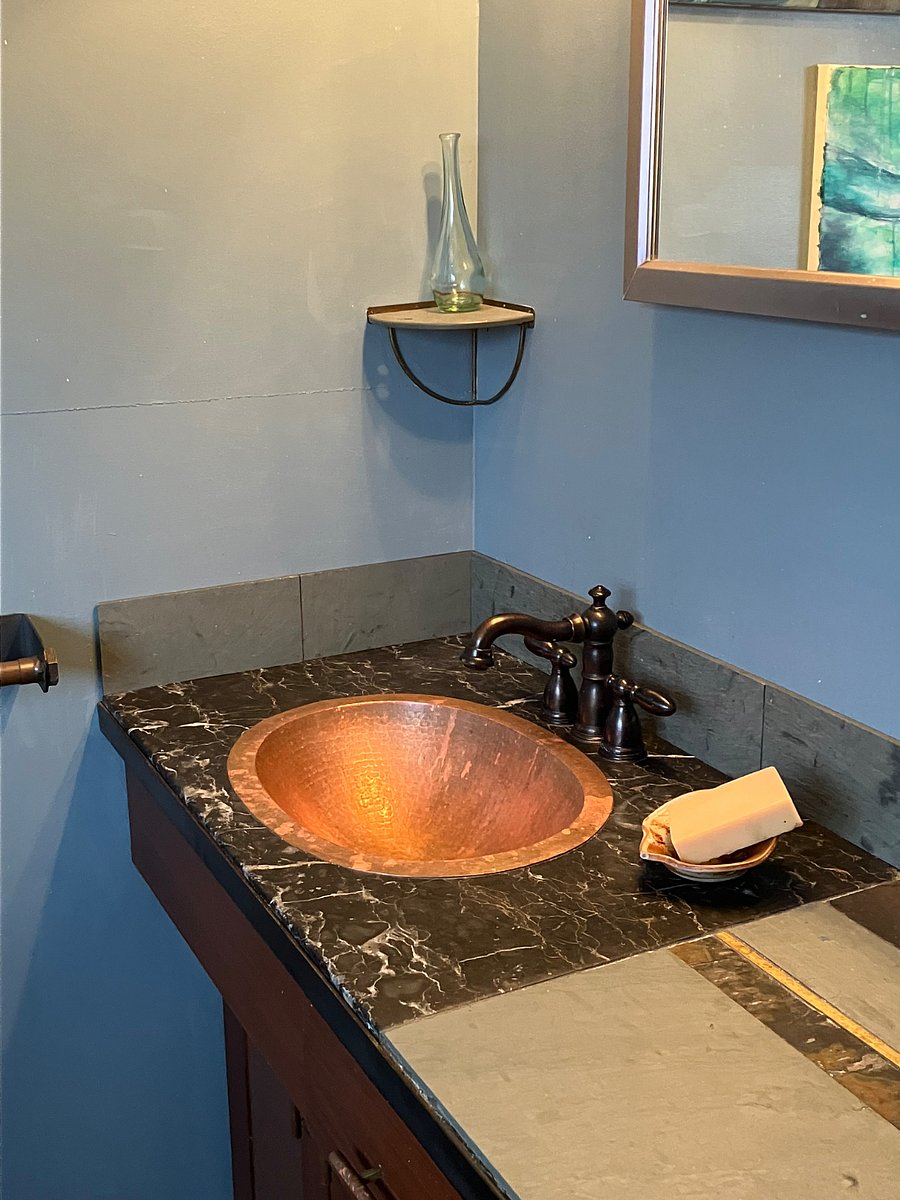 Hand forged copper bathroom sink.