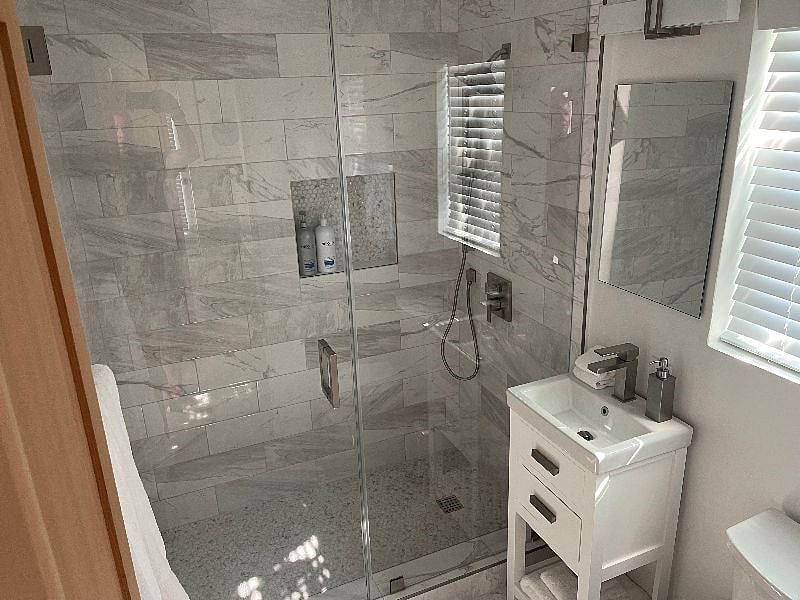 Spa inspired bathroom with tiled shower. Brand new!