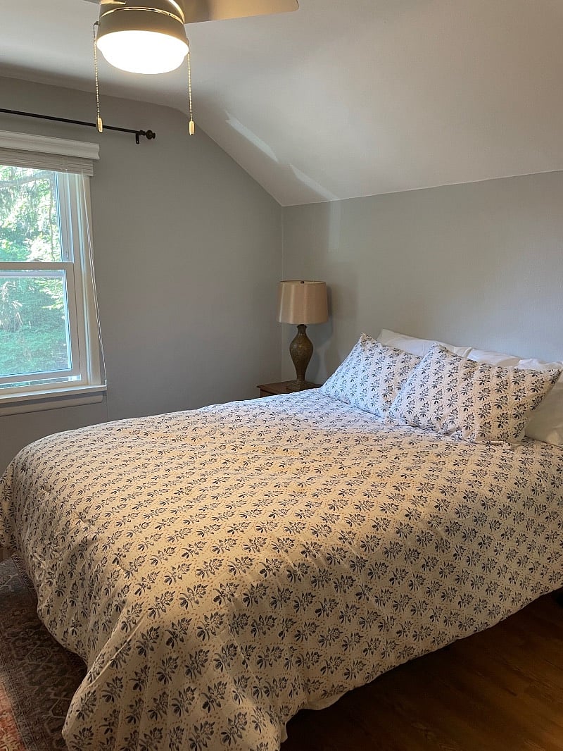 Bedroom 2 has queen size bed and chair with nice size closet with full length mirror.