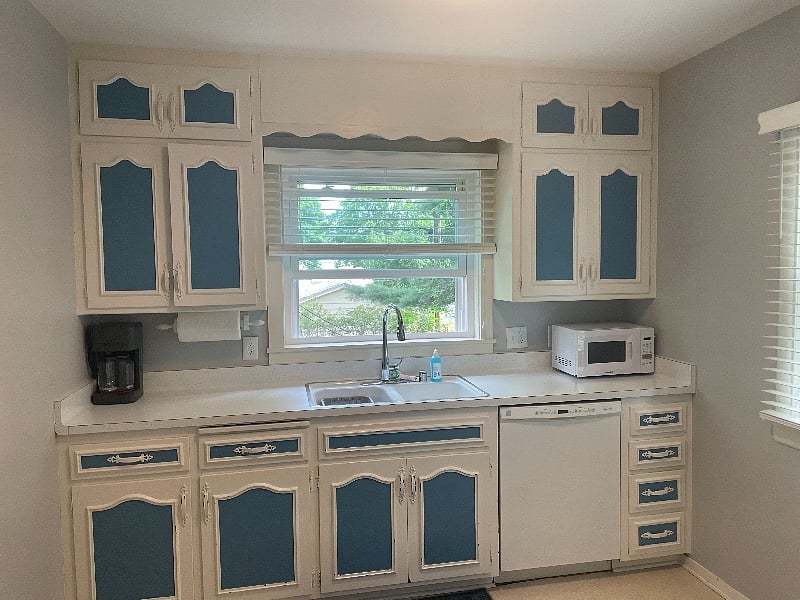 Fully fitted kitchen with microwave, coffee-maker and toaster.