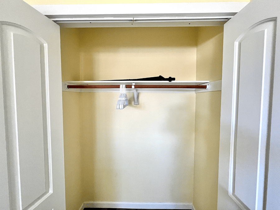 Closet space for blue bedroom.