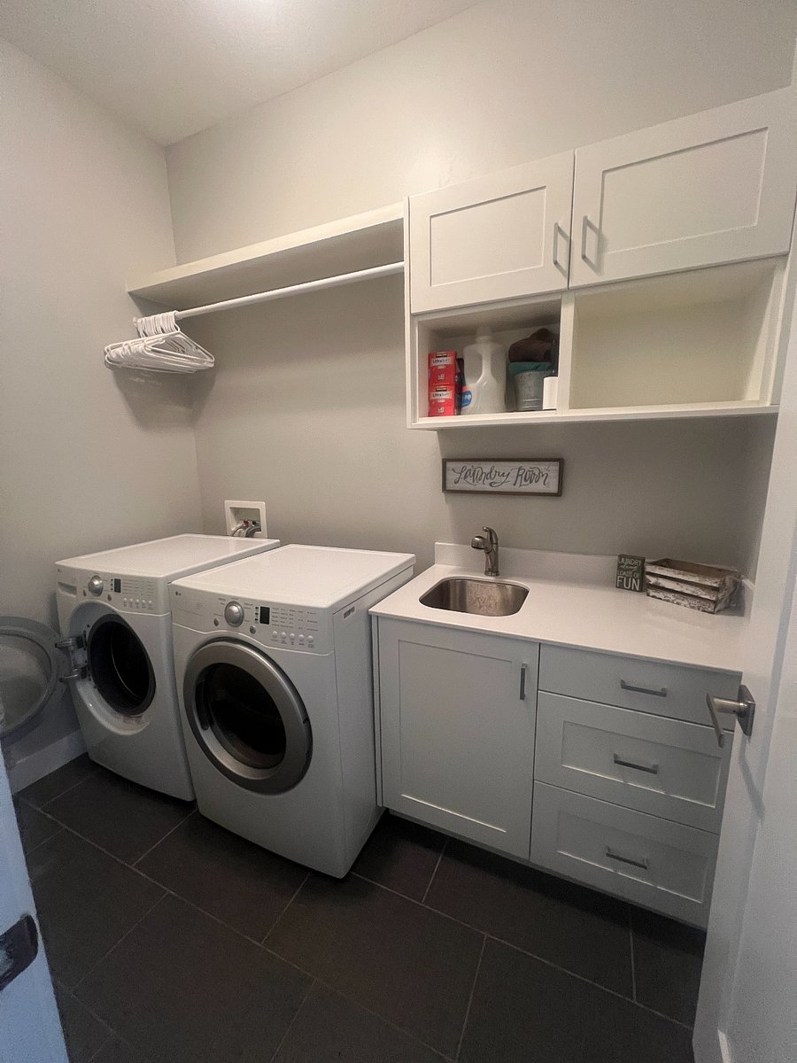 Laundry Room. Empty shelf is for tenant.