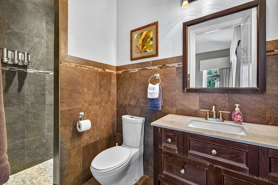 private ensuite bathroom w/ hair dryer and walk in shower