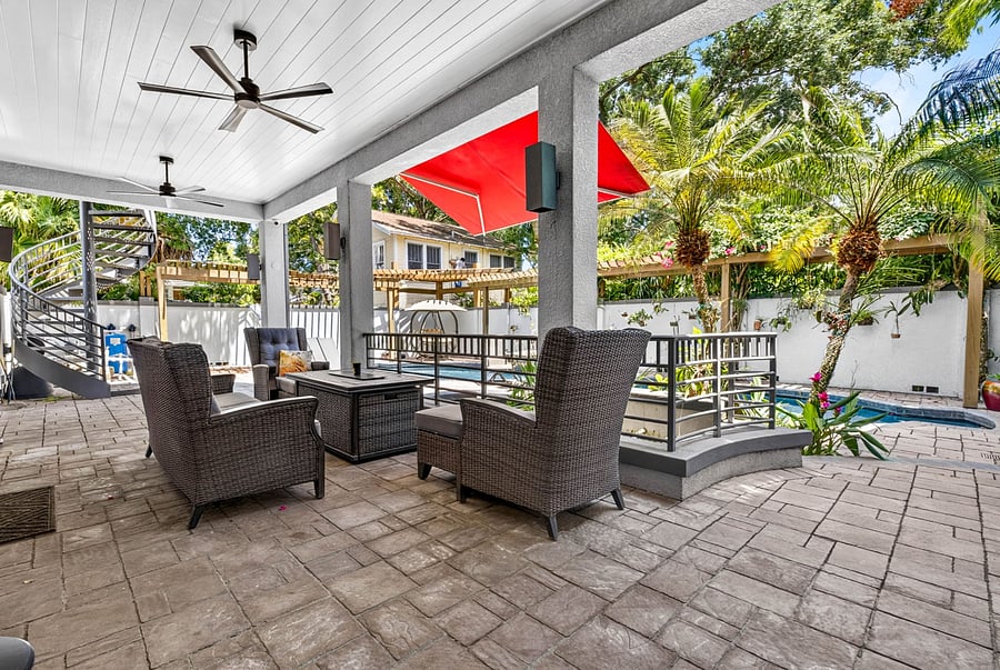 patio overlooking koi pond and swimming pool