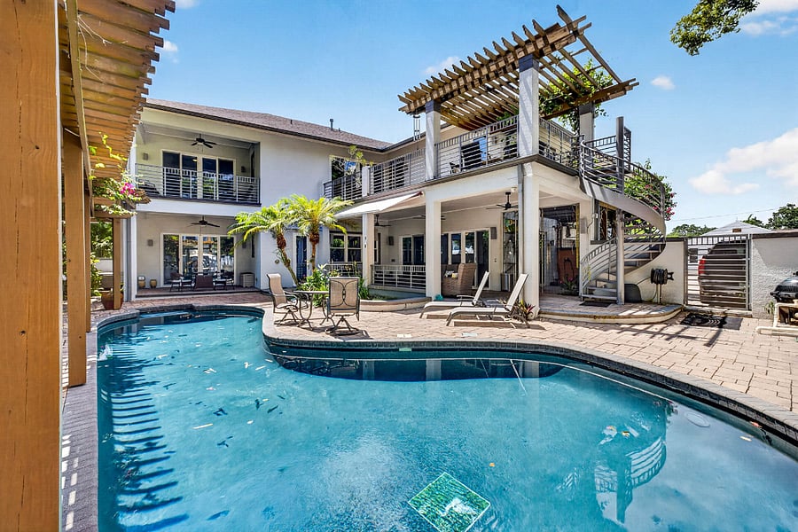 salt water swimming pool view toward house
