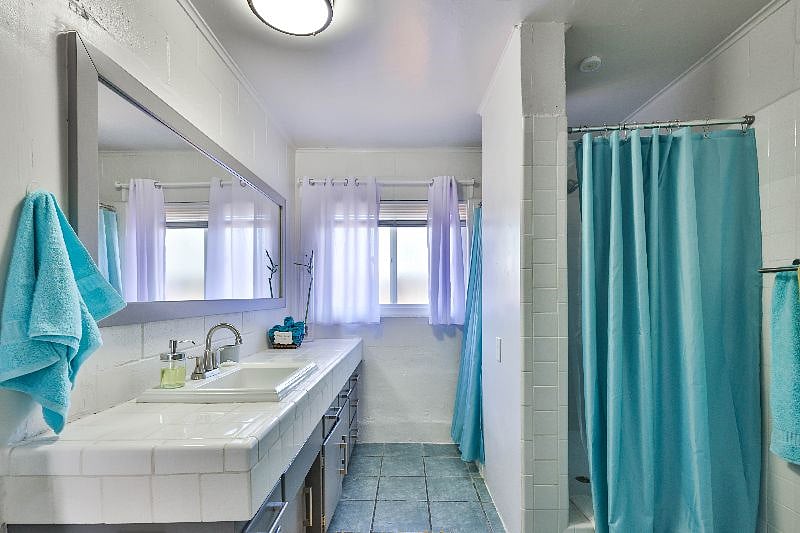 Indulge in a warm shower or bath before bed or after the beach.