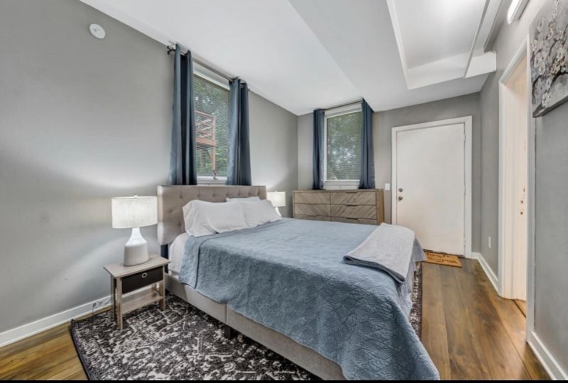 Master bedroom with black out drapes.