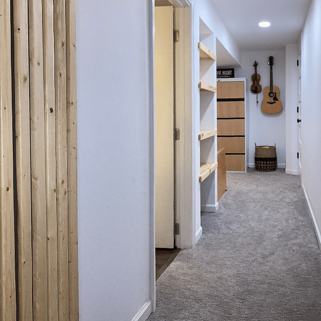 Laundry on L, entry to guest area, bathroom on L, bedroom on R