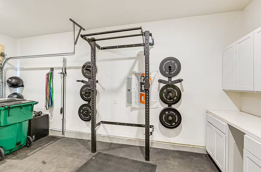 Gym equipment: One 45lb barbell with two plates, resistance bands, pull up bar, box for jumps, weighted sandbag balls