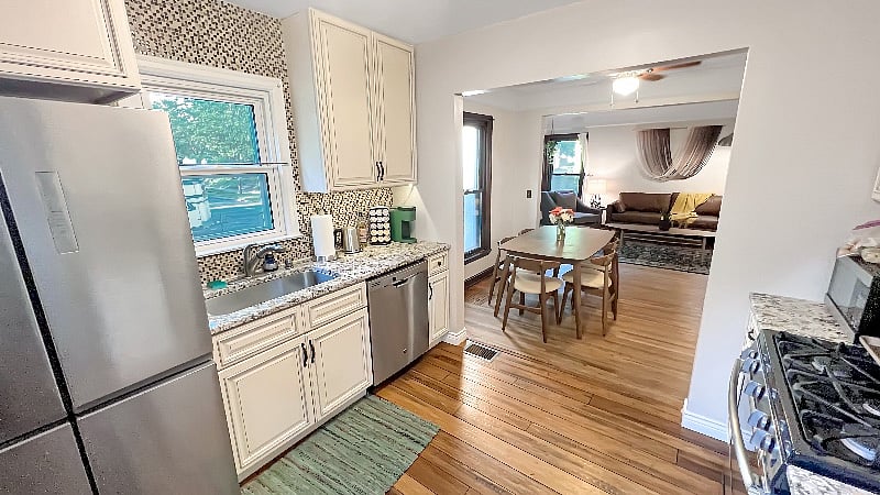 The kitchen features a large fridge/freezer, dishwasher, stove/oven, microwave, toaster, and electric kettle. There's a Keurig as well as a traditional drip coffee pot. In the cabinets you'll find dishware, wine glasses, pots/pans, and more.