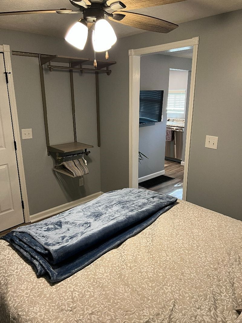 Open closet and shelving.