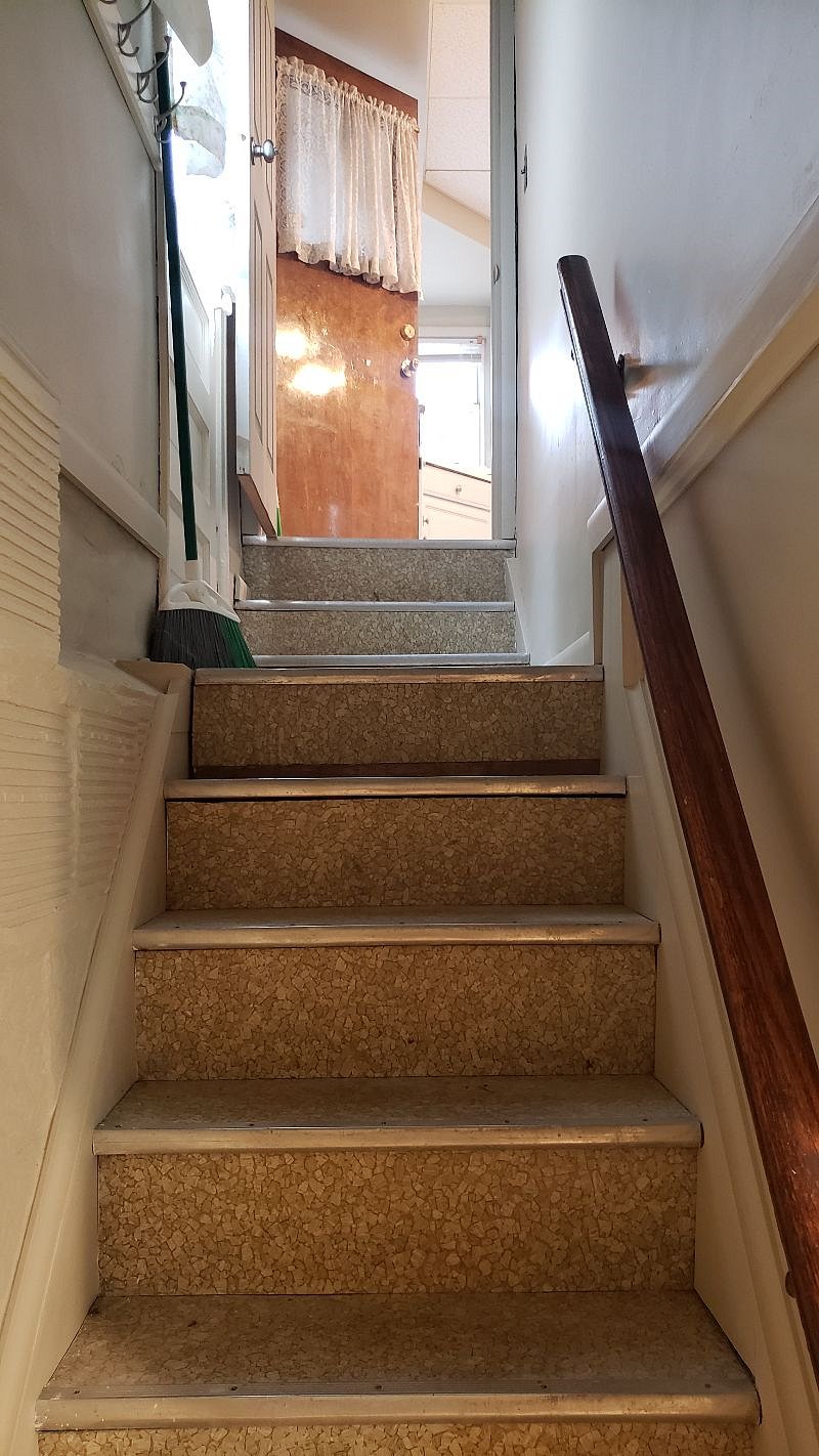 Same stairs looking up to kitchen.