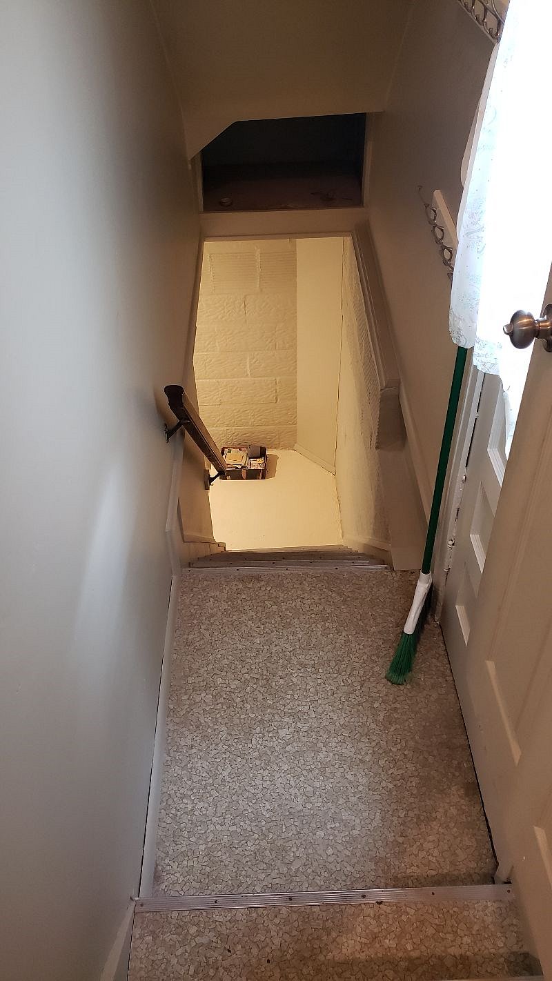 stairs from kitchen to basement.