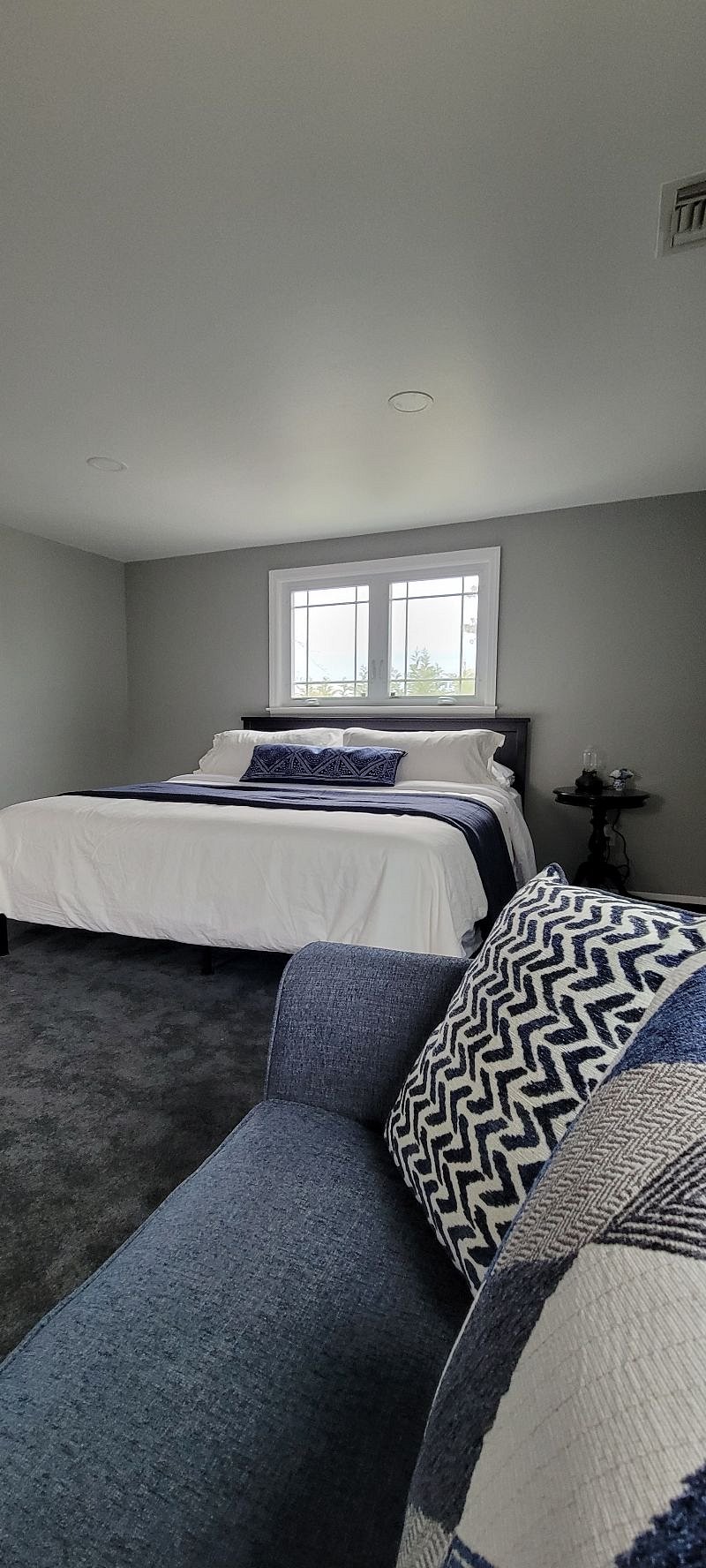 This king suite is 2x the size of the other bedrooms. It is $2100/mos. This will get reduced each time a tenant comes to share the space. 
