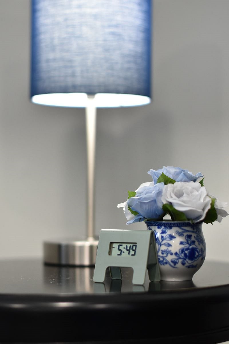 Easily charge devices by bedside with usb ports and outlets on each lamp stand.
