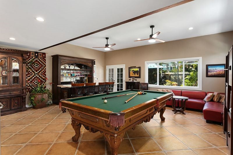500 sq ft entertainment room with executive pool table and full bar