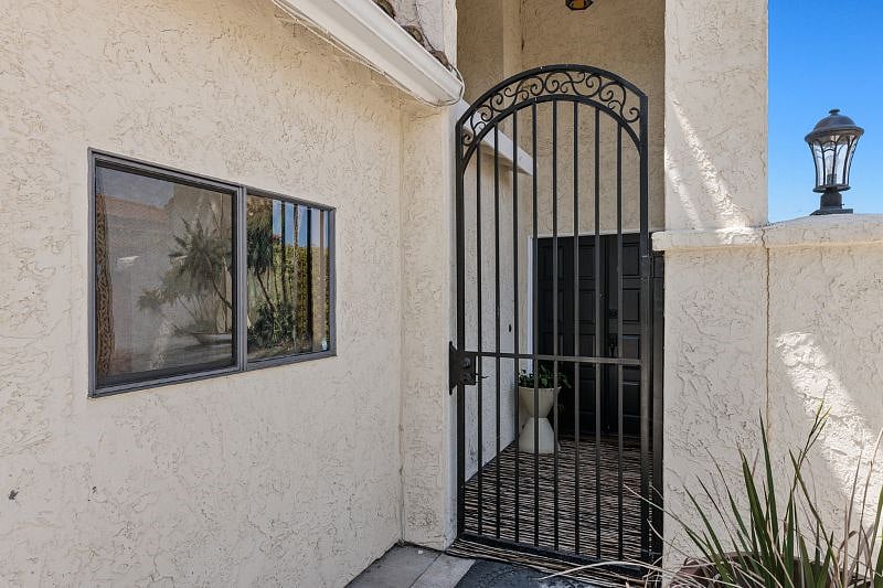 Gated front entryway.