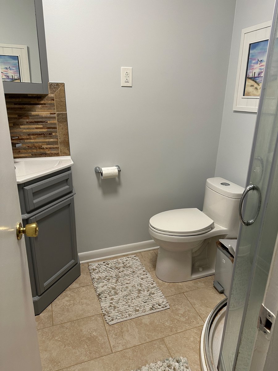 This bathroom is shower only. It is attached to the room. 