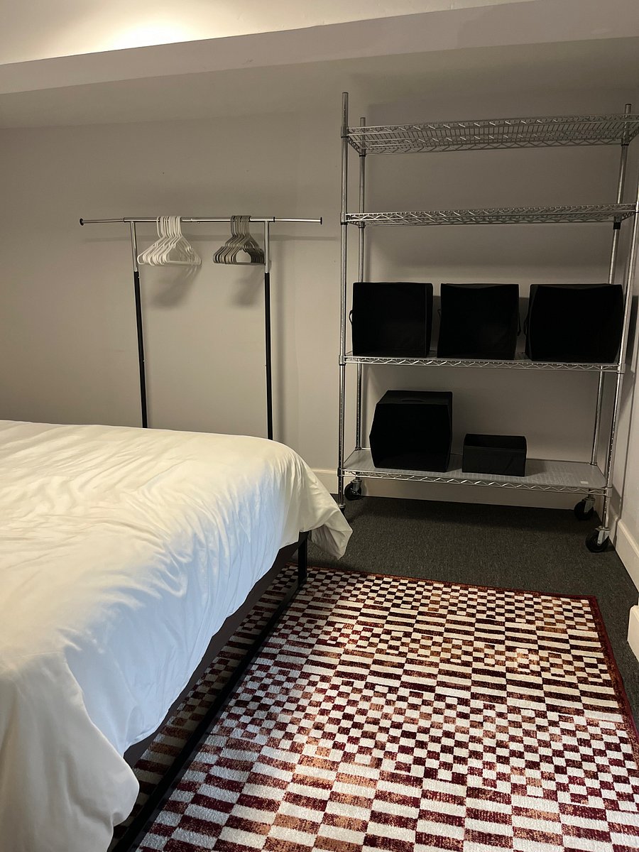 Bedroom with Storage and Clothing Rack