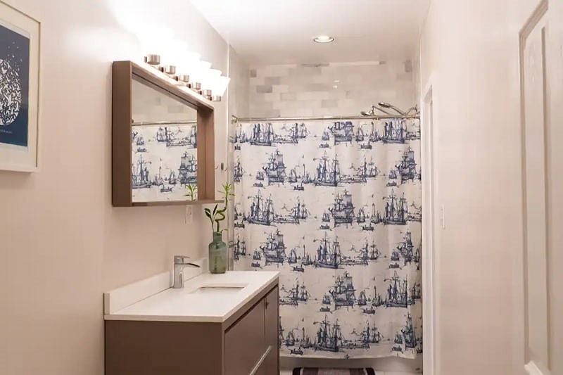 Huge Bathroom with large vanity and mirror. Dual Flush toilets. Comes with all bathroom essentials: towels, wash cloths, shower products, etc.