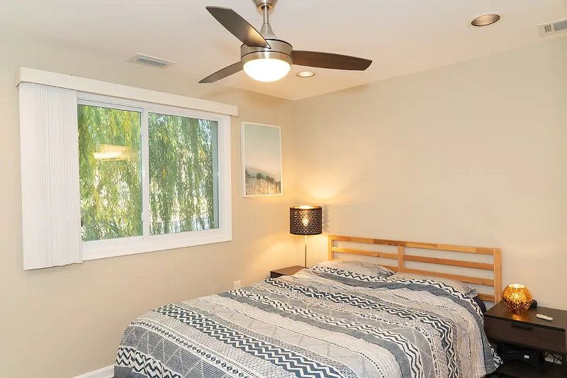 Bedroom in the back of Condo has super comfortable Queen Bed thanks to a Serta Cool Mattress Top. Enjoy the tranquil views of a large willow tree right outside the bedroom window.