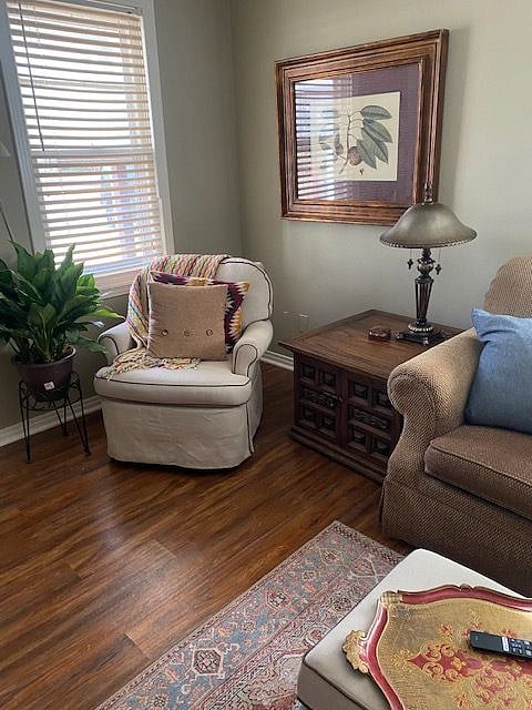 The porch window gives you great light while enjoying the swing rocker just inside.