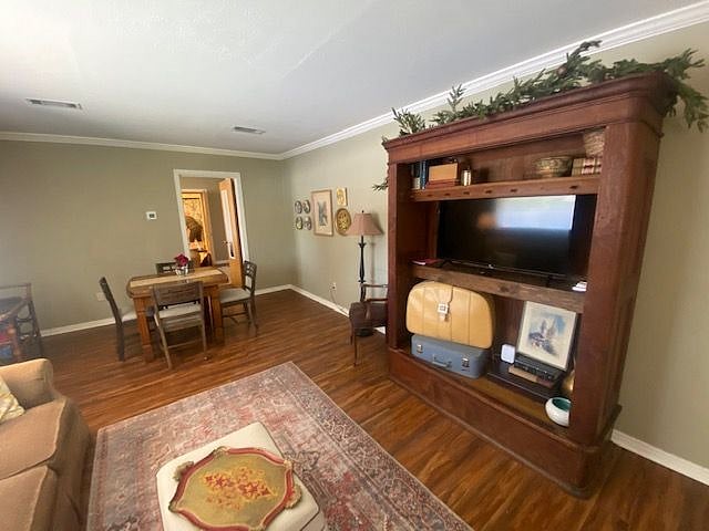 The antique oak wardrobe houses the new smart TV! Ready for streaming with our furnished Wi-Fi!