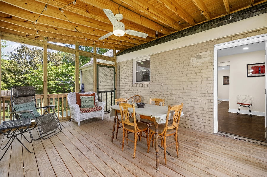 Private screened-in deck with ceiling fan and lights