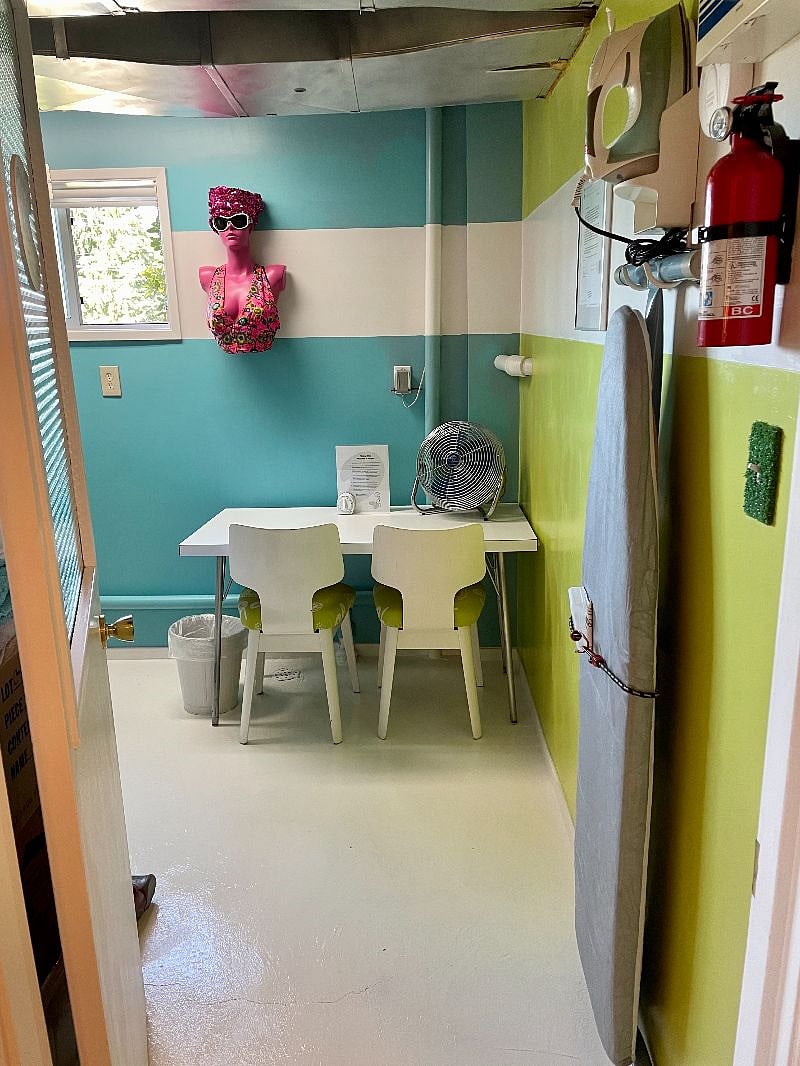 Laundry/Utility workoom: 47" table for laptop, laundry tasks, hobbies. Two side chairs.