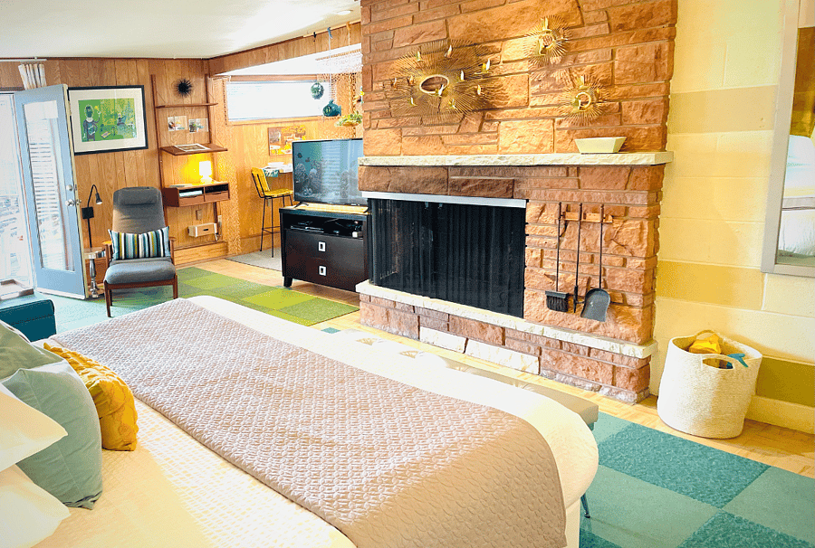 Wrap-around wood-burning fireplace. Starter Presto log, provided.