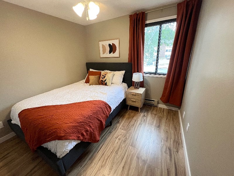 21-Second bedroom with queen sized bed.