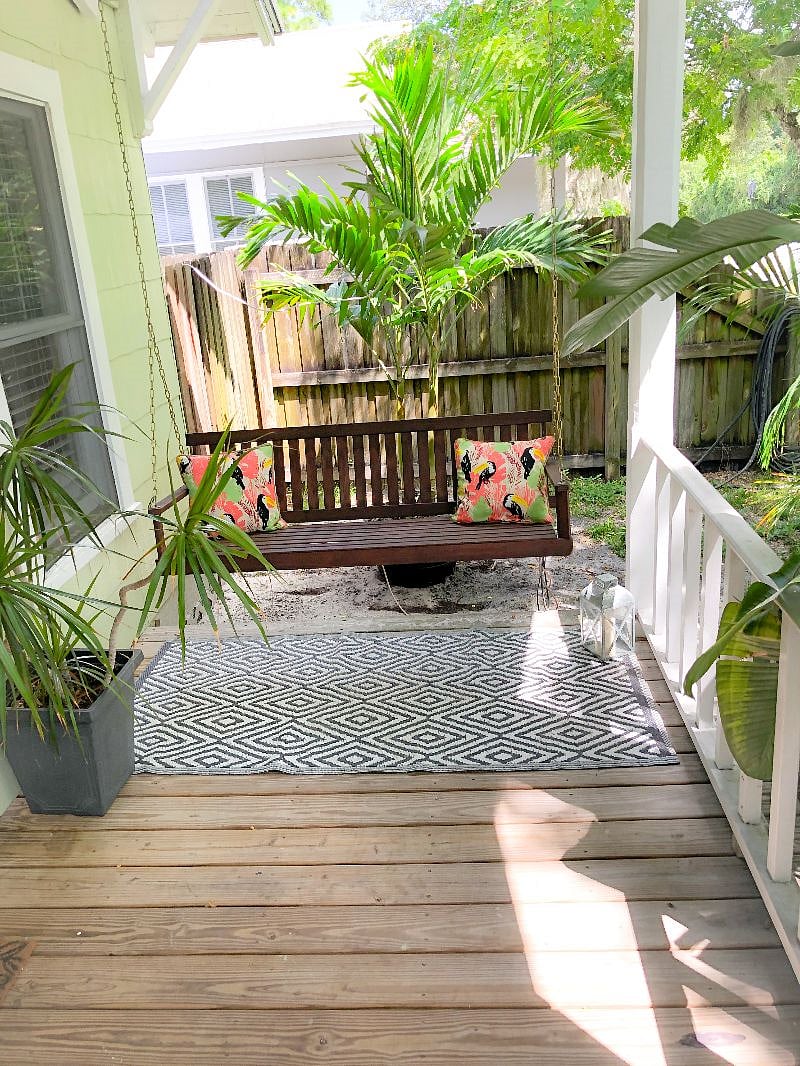 Covered front porch with swing bench