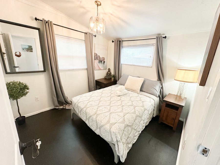 Bedroom 2 with black-out curtains and keyed lock