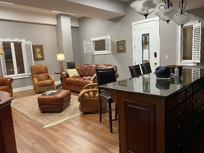 Granite snack bar is open to the great room.