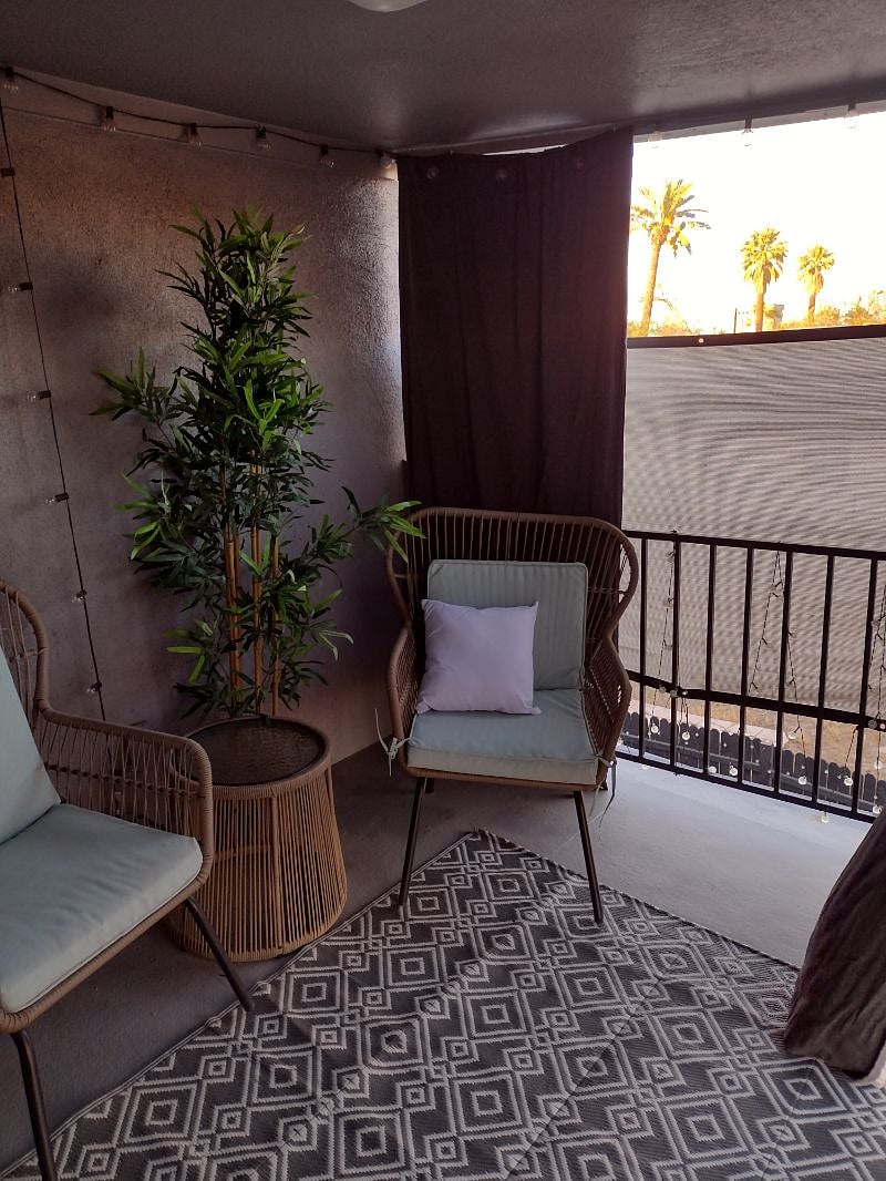 Covered patio with sun shades for privacy