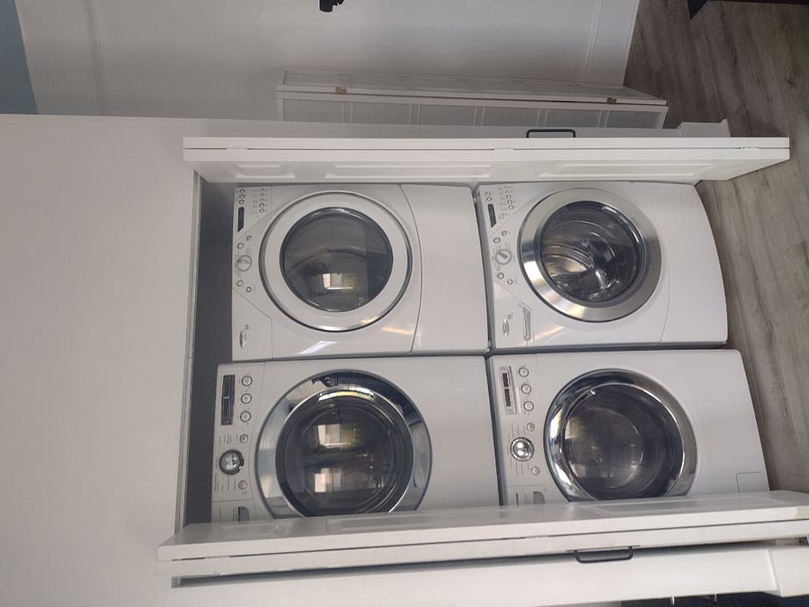 Free washers and dryers located in foyer
