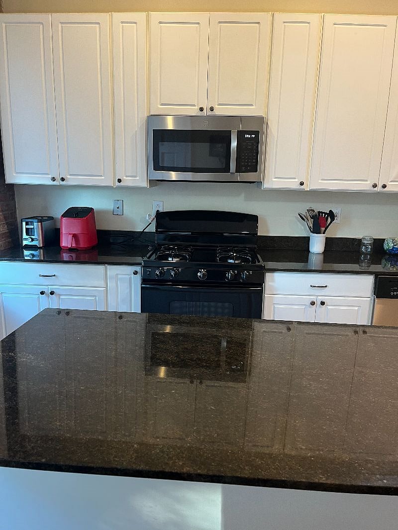 Kitchen - New Stove and Microwave.