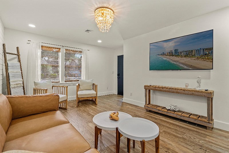 House 2- Caribbean Queen- Living Room

65 inch smart TV