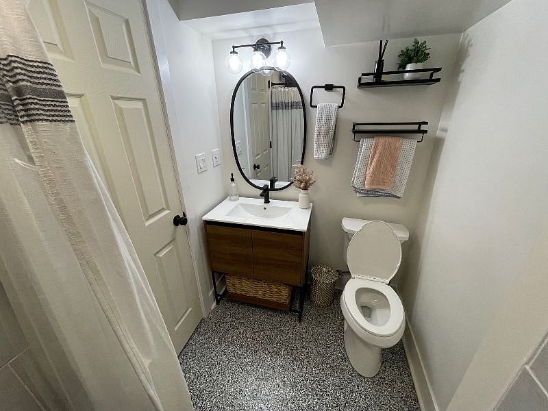 Bathroom - just steps away from your bedroom in a private corner of the basement.