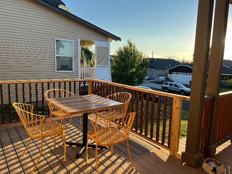 Deck off the front of the house with 180degree views of the mountains.  Absolutely stunning evenings.  Covered deck for winter as well.