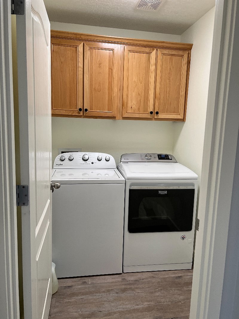 Laundry room with washer and gas dryer - shared