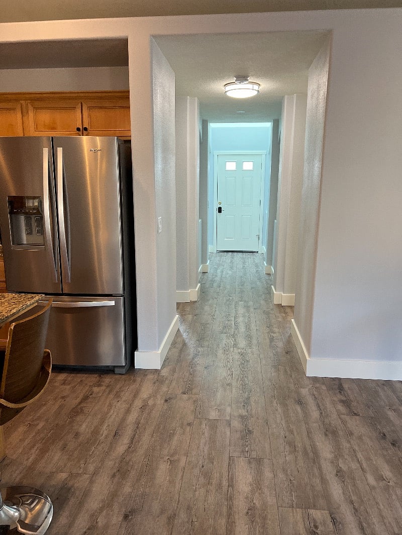 Hallway to front door, bedroom #2 & 3, and main bath.