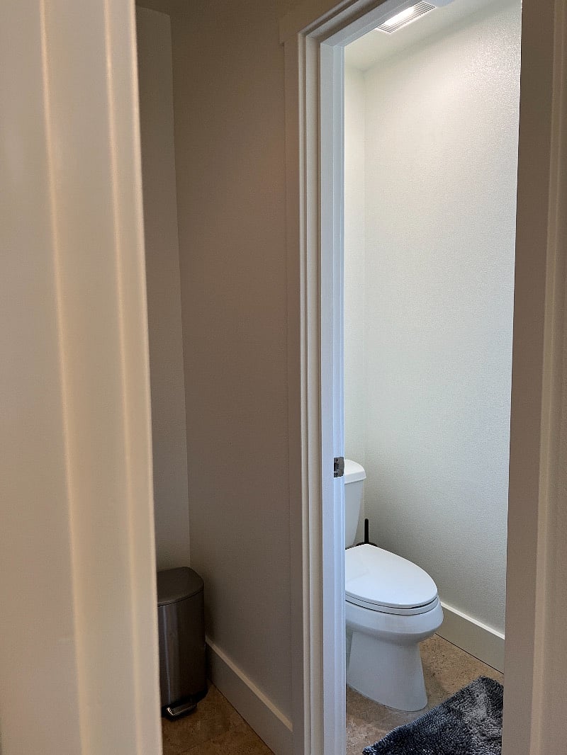 Private toilet room in primary bathroom