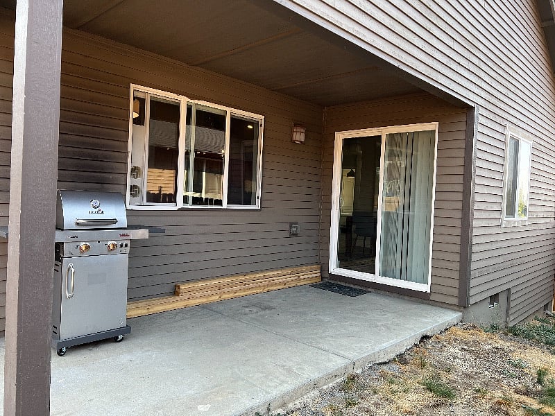 Backyard patio with a BBQ