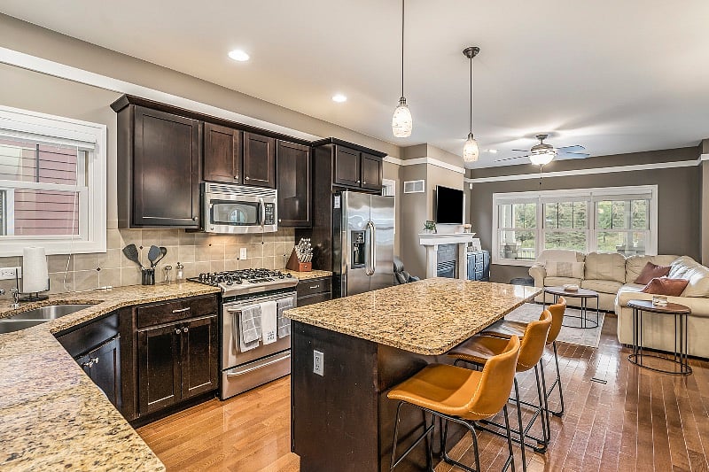 A gourmet kitchen with top knotch cutlery, pots and pans. 