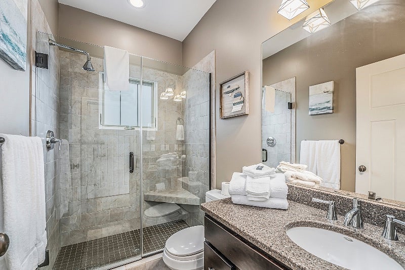 Main floor full bathroom. Enjoy the upgrades in the house. All showers are beautiful tiles, not just inserts like you'll find in many homes.