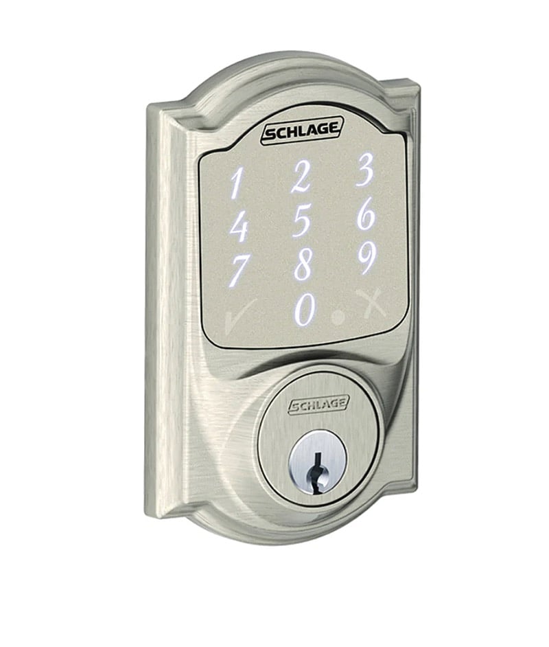 Outside front door, use code to unlock and press Schlage to lock 